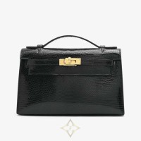 HERMÈS  KELLY POCHETTE CLUTCH BAG IN BLACK SHINY NILO LIZARD | Kuwait City 🇰🇼