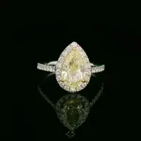 Fancy Yellow Pear-Shaped Diamond Ring in 18K White Gold – 2.15ct IGI Certified with Diamond Halo | Dubai 🇦🇪