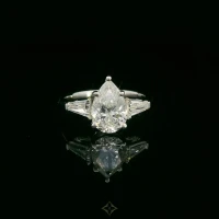 18K White Gold Pear-Cut Diamond Ring – 2.01ct GIA-Certified Center with 0.61ct Tapered Baguette Side Diamonds | Dubai 🇦🇪
